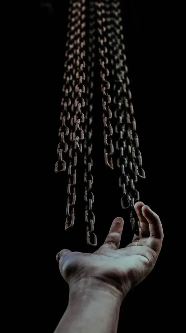 Chains leaving a hand behind
