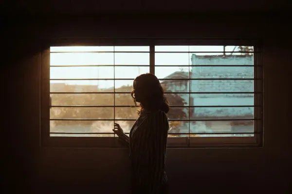 A hand extinguishing a cigarette as part of a judgment-free reset after a slip